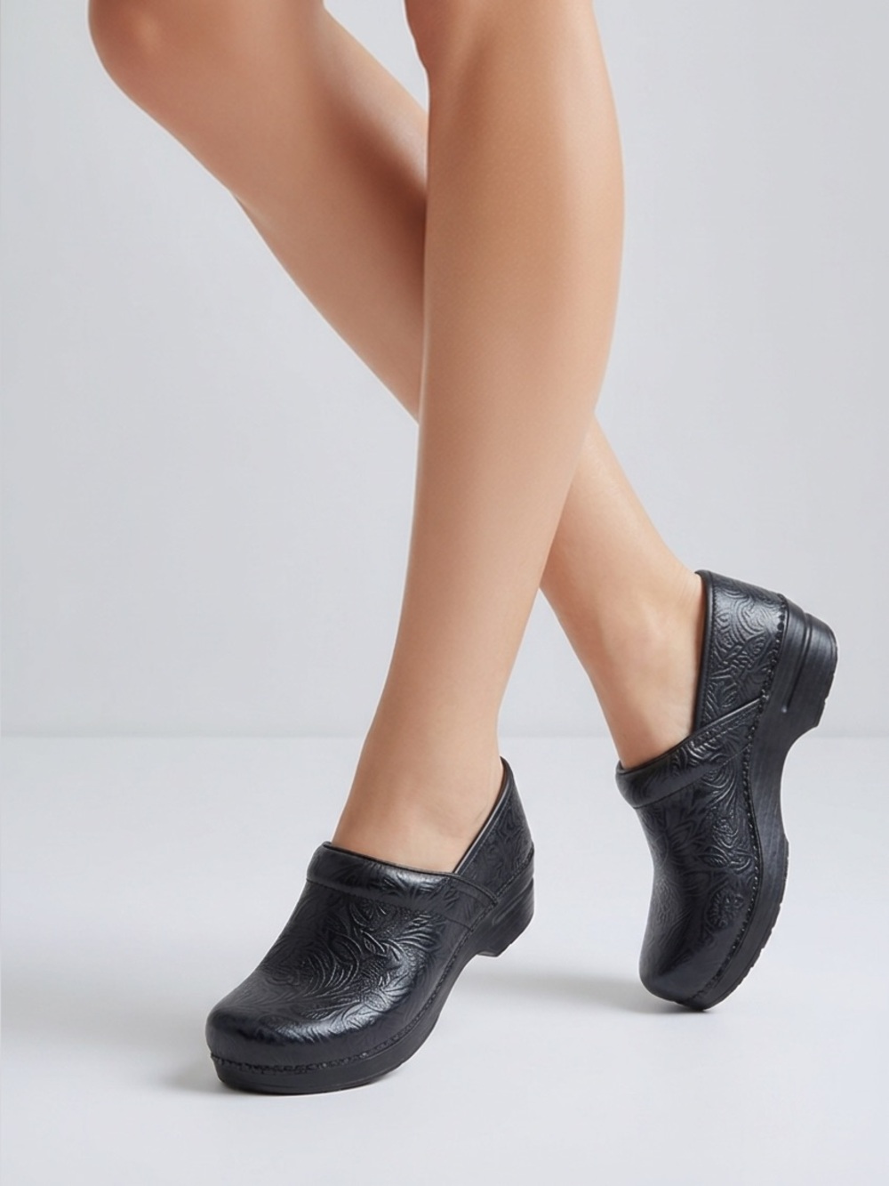 Dansko XP 2.0 Clogs in Black Floral Tooled/Embossed Leather